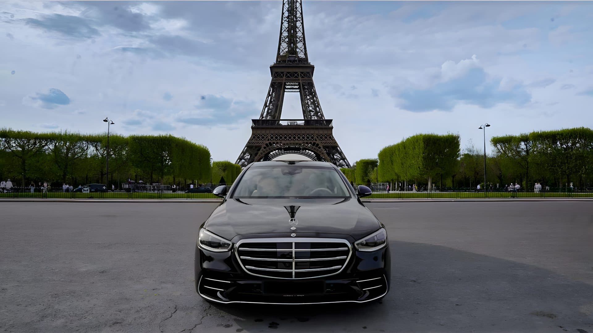 Luxury Mercedes in front of Eiffel Tower